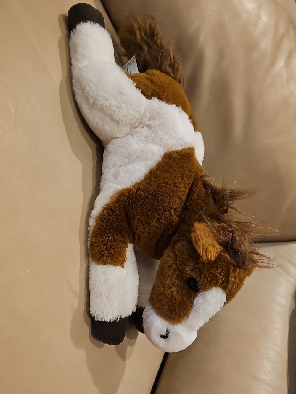 FAO Schwarz Brown and White Plush Horse